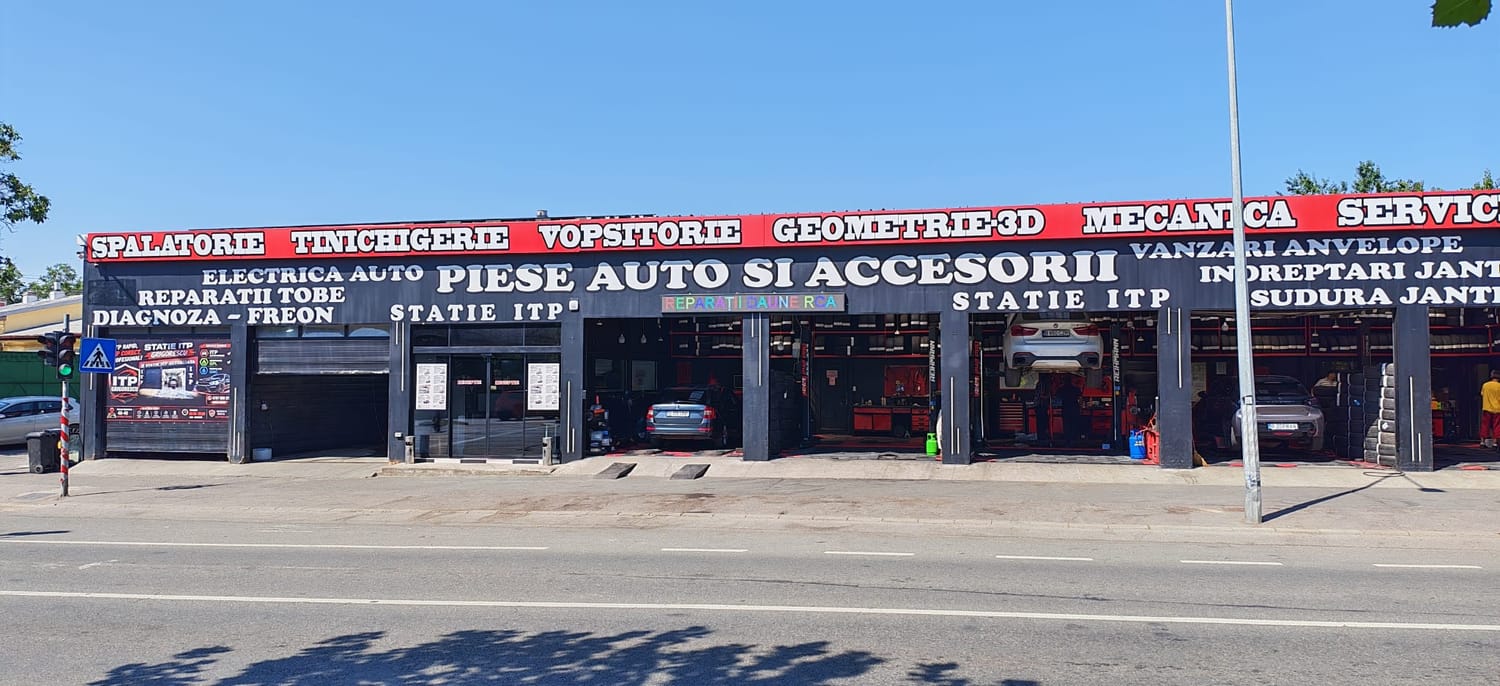 Fațada Service Auto Grigorescu pe Bulevardul Nicolae Grigorescu 46–48, cu boxele de mecanică, tinichigerie, vopsitorie, service roți și stația ITP